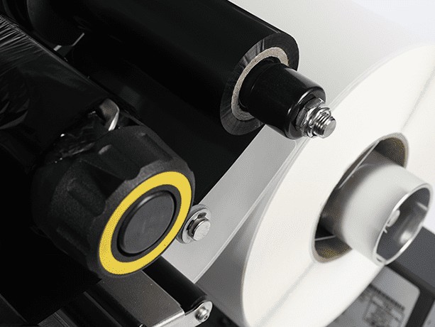 Labels being printed and finished on a label press